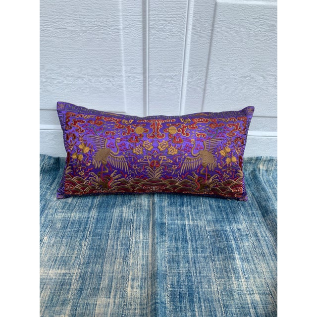 Boudoir lumbar pillow made of a vintage colorful embroidered silk Asian textile fragment from a Chinese Opera Robe. A...