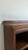 Constructed in oak with a rich, warm patina, the piece features a handsome molded cornice top and a base with a stepped...
