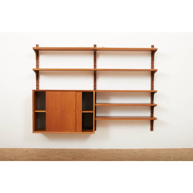 Wall Shelf in Teak by Poul Cadovius for Cado, 1948, in Good conditions. Designed 1920 to 1949 I have official proof of...
