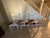 Bring a touch of country charm to your kitchen or bar with this set of three cute farmhouse -stlye barstools! Featuring...