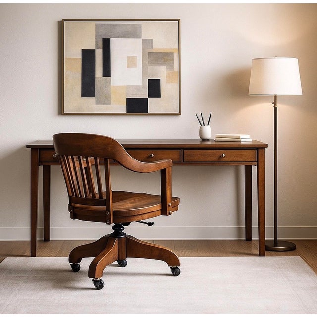 This is an early carved oak office chair by the renowned manufacturer Gunlocke Chair Company. This model is known as the...