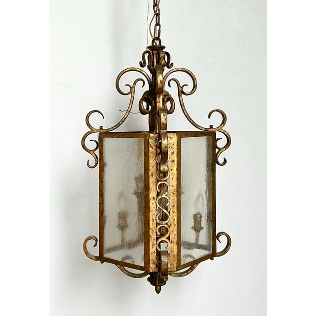 Command attention with this exquisite Vintage Regency Gilt Lantern, a stunning piece that radiates old-world grandeur....