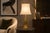 A striking and sculptural table lamp, embodying the bold geometric glamour of 1970s Italian design. The lamp features a...