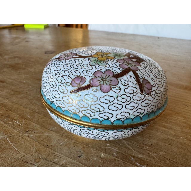 Vintage cloisonné trinket box with floral motif.