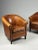 Set of two sheepskin club armchairs. In absolute mint condition! Beautiful color and patina. Dimensions: 76W x 80D x 83H 48sh
