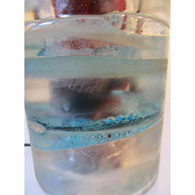 Solid glass lamp from the Limburg glassworks, transparent layered glass in different light colors with copper core as...