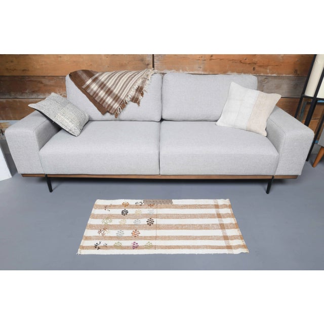 Vintage Turkish Hand-Knotted vintage rug is a semi-Vintage kilim small rug.'70s Eastern region of Turkey's unique rug is...