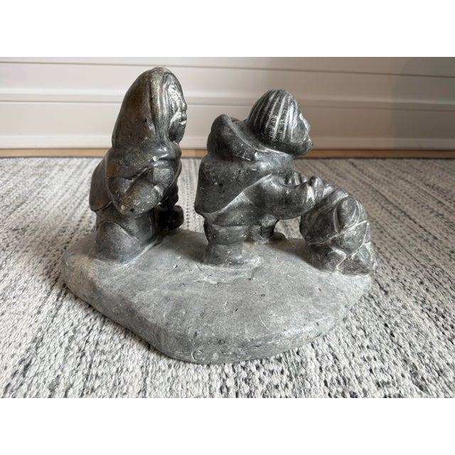 This charming, authentic, vintage, and heavy carving from 1979, signed by the artist (likely Aloupa Eetook), beautifully...