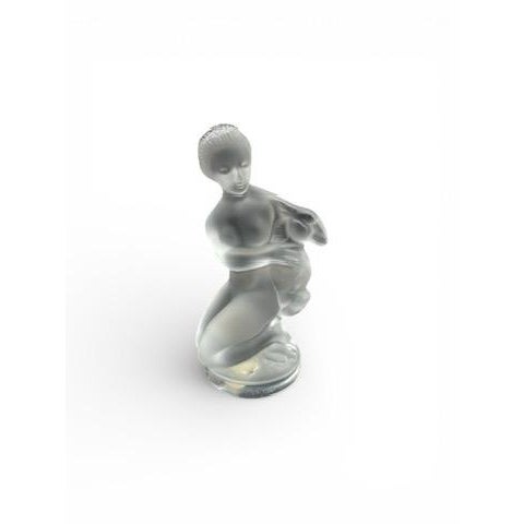 An elegant Lalique France crystal figurine depicting Diana the Huntress, goddess of the moon and the chase. Designed in...