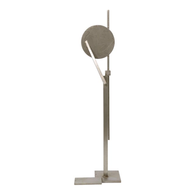 Abstract floor sculpture created by Michigan artist Robert Hansen, executed in stainless steel. The piece is constructed...