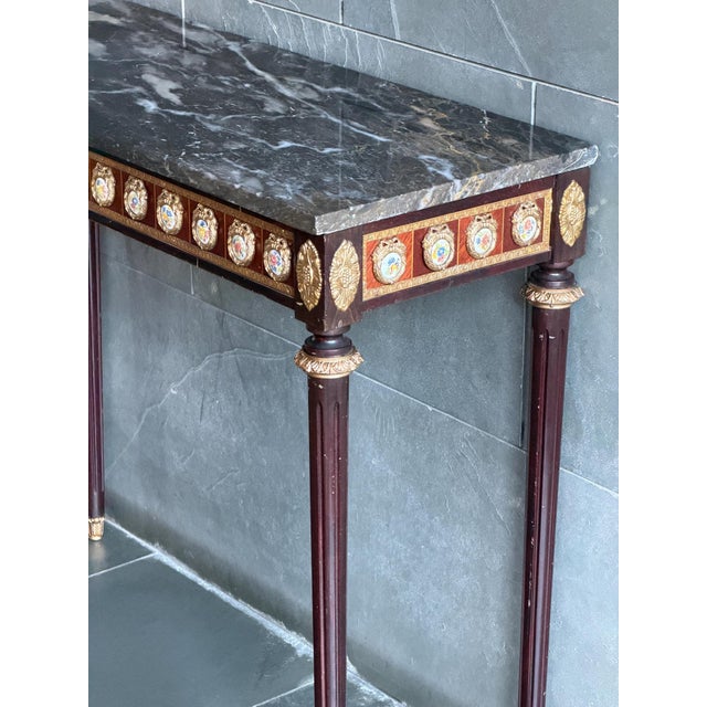 Exceptional French console table from the Belle Époque period, circa 1895–1915, executed in the refined Louis XVI Revival...