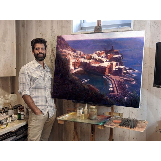 The artwork depicts a vibrant aerial view of Vernazza, capturing the charming coastal village nestled against dramatic...