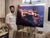 The artwork depicts a vibrant aerial view of Vernazza, capturing the charming coastal village nestled against dramatic...