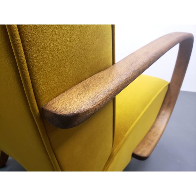 1930s Jindrich Halabala Bentwood Armchair, a timeless piece that epitomizes the elegance of early 20th-century Czech...