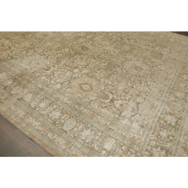 An early 20th-century Persian Khorassan Room size antique Rug. Peach, Brown, soft blues colors highlight this gorgeous...