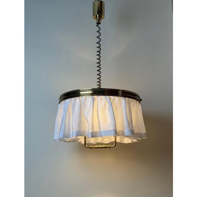 An exceptionally rare and beautifully crafted austrian pendant lamp of museum-quality craftsmanship, executed in solid...