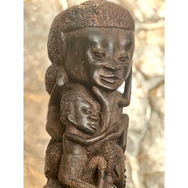 Overview An exceptional, monumental mid-20th-century African Makonde "Tree of Life" (Ujamaa) sculpture, hand-carved from a...