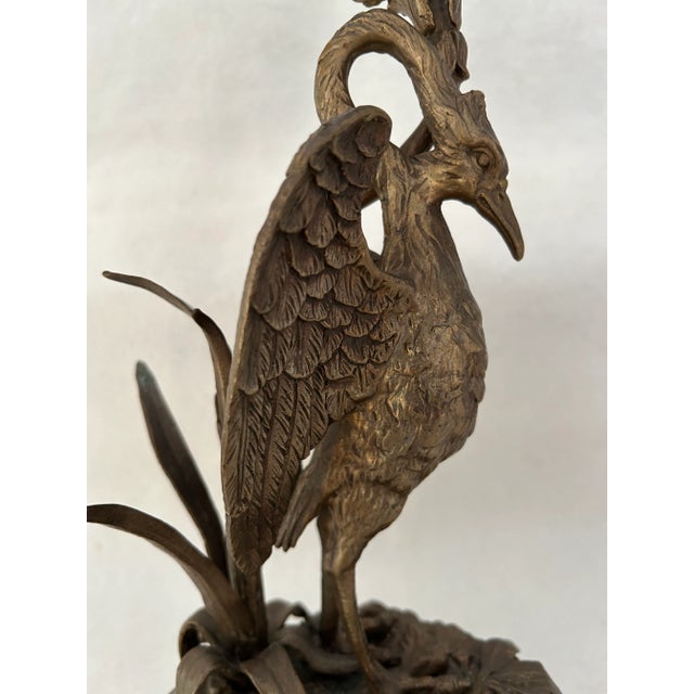 This bronze crane candelabra has a lovely patina! It would be a beautiful and elegant addition to any space, adding a...