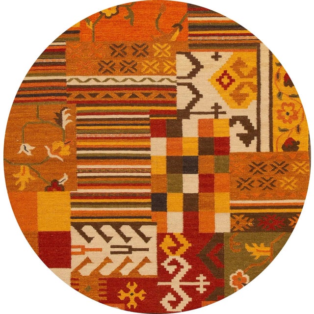 A beautiful hand-woven modern Kilim rug with an orange field and multi-color accents in an all-over geometric design. This...