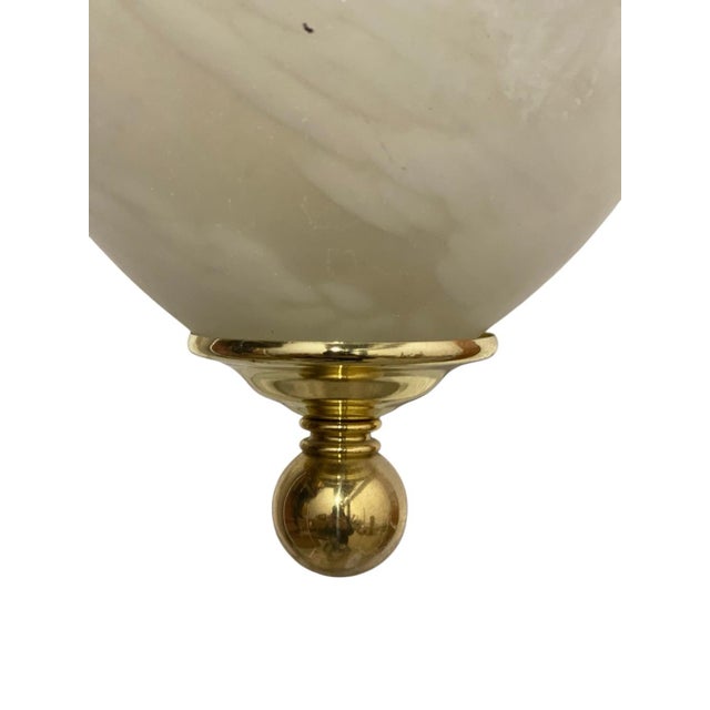 25” tall 9” axeoss across 30” chain 45” wire brass plated Make a stunning first impression in your entryway or hallway...