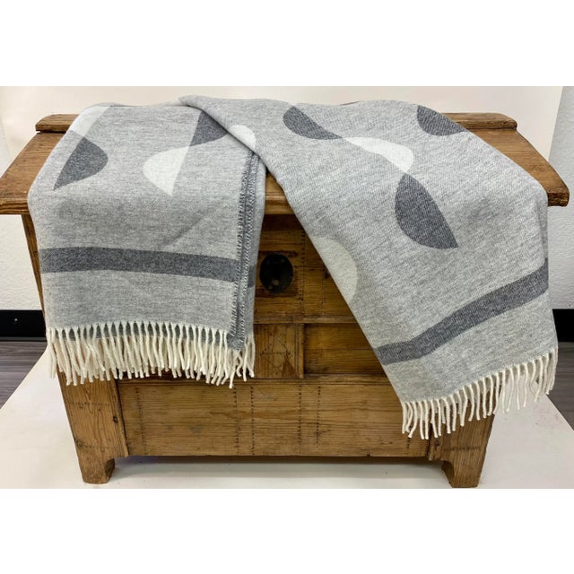 Super Soft Merino Wool Throw In A Modern Monochrome Gray & White Geometric Pattern. Made in England A versatile throw with...