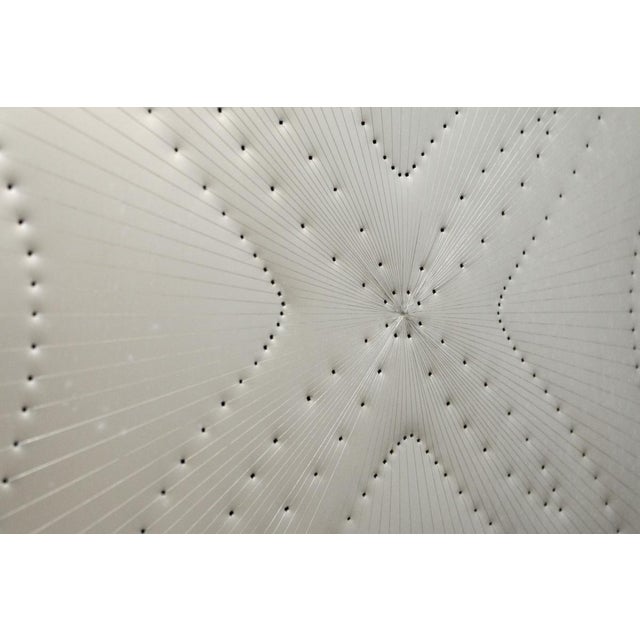 An artwork on aluminum panel by peck blenda (also known as pek), an exponent of op art in the 1970s, a movement in...