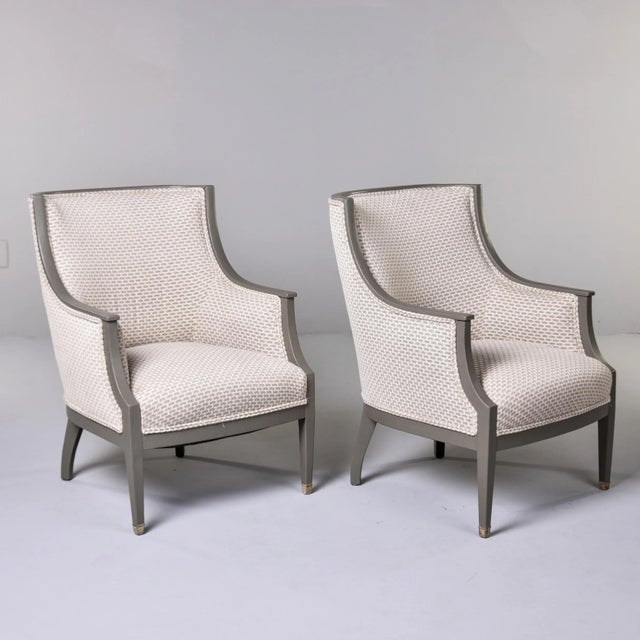 Found in Europe, this pair of Swedish chairs date from the 1930s. Wood frames have a painted finish in a shade of greige....
