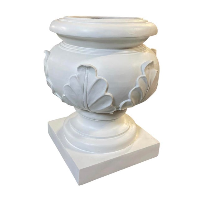Elevate your space with this elegant vintage cache pot, meticulously crafted from durable cast resin. Inspired by...