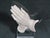 A quiet mid-century devotional accent featuring softly sculpted praying hands in resin, mounted onto a clear glass panel...