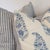 Katie Leede Mughal Gardens paisley floral pillow in blues on a white background, with coordinating blue and white striped...