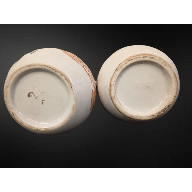 Republic period or later, first half / mid-20th century A charming pair of Chinese bottle vases, each with a globular body...