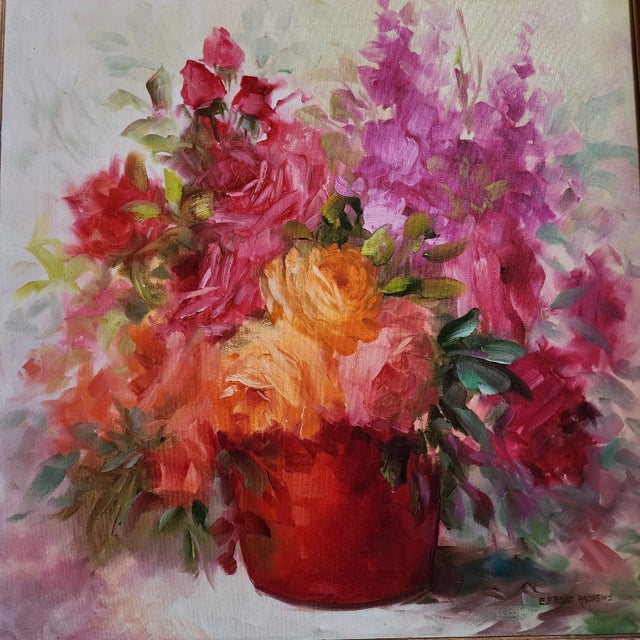 Impressionistic style brightly colored painting of a bouquet of pink, orange, and red flowers by E. Frost Andrews. Framed...
