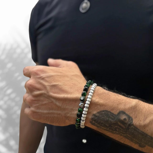 Elevate your accessory game with the Men's White Howlite & Silver Hematite Beaded Adjustable Bracelet, a perfect blend of...