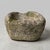 A superb utilitarian vessel carved from a single block of natural stone, this 19th-century trough-crucible embodies the...