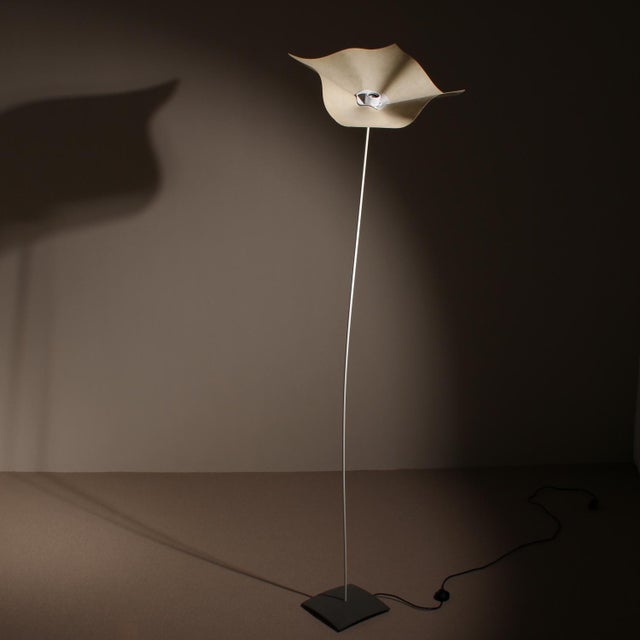 Description an exceptional floor lamp ‚area‘ by designer mario bellini, manufactured by artemide in italy. The design...