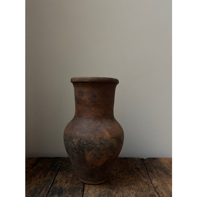 Antique clay milk jug from Ukraine originally used for storing milk. Lots of character and charm and perfect for use as a...