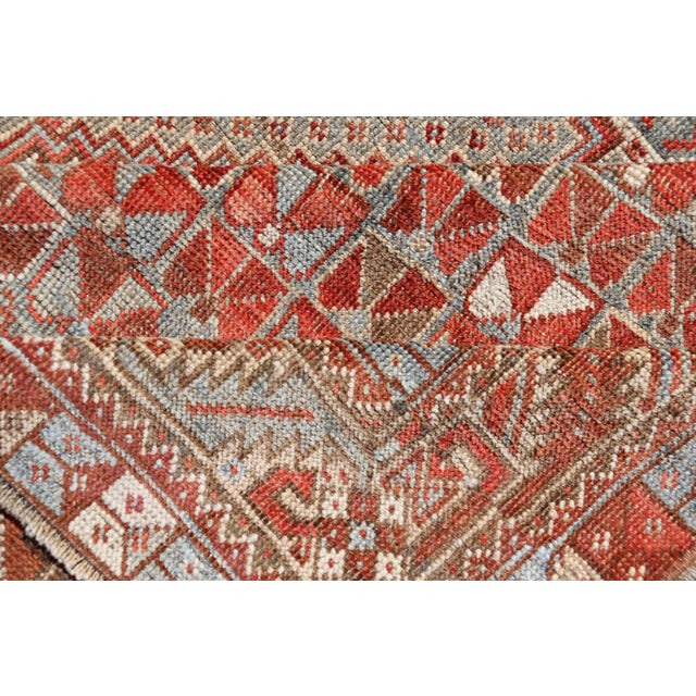 Antique Distressed Persian Medallion Shiraz Rug in Shades Rusty Red & Steel Blue For Sale - Image 9 of 10
