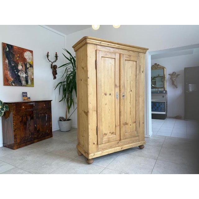 Restored antique farmhouse cupboard, natural wood, from the Biedermeier period. Dimensions: Height x Width x Depth 186 x...
