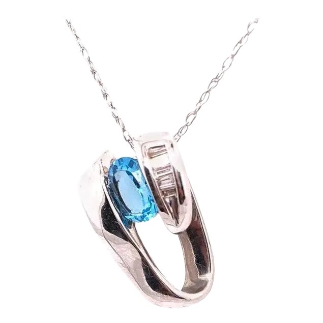 14 Karat White Gold Link With Oval Blue Topaz and Baguette Diamonds For Sale
