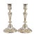 Pair of cast brass and silver plated candlesticks with fluted base and shaft. The candle cup is fitted with a bobeshe in a...