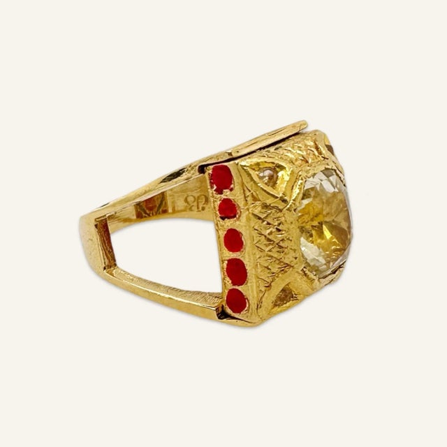 This ring was custom-made from a charm that was part of a Victorian slide bracelet where each of many charms is threaded...