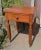 Antique Cherry One Drawer Stand 1860s Era An antique solid cherry one drawer stand that dates back to the 1860s era....