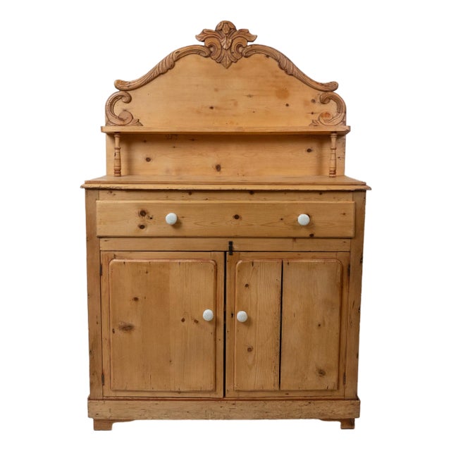 Late 19th Century Large French Pine Sideboard With Carved Crest and Shelf For Sale
