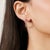 These refined earrings are crafted in 925 sterling silver and feature a sleek vertical bar design set with natural square-...