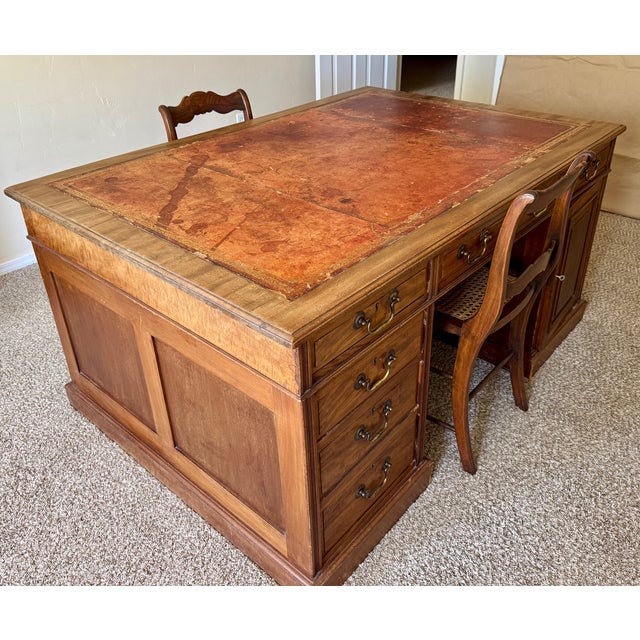 This British colonial, 19th century Georgian partners' desk has one key that unlocks the drawers and cabinets on both...
