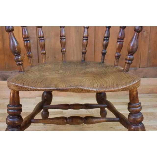 Beautiful Victorian era armchair called "Captain Chair" or "Smoker Chair" in wood turned with four feet connected by a...