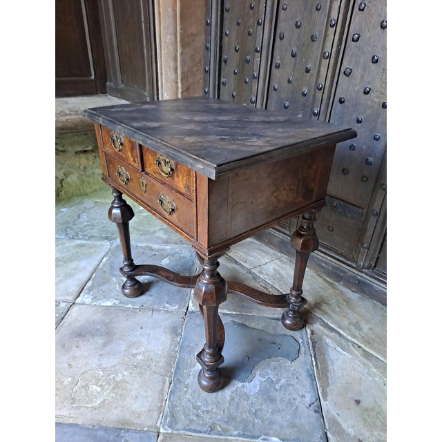 Hutton-Clarke Antiques are pleased to offer this attractive low walnut side table, a good quality copy in the Queen Anne...