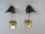 A pair of elegant and exceptional wall lights made in Italy in the 50s. The lampshades are made of black painted aluminum...