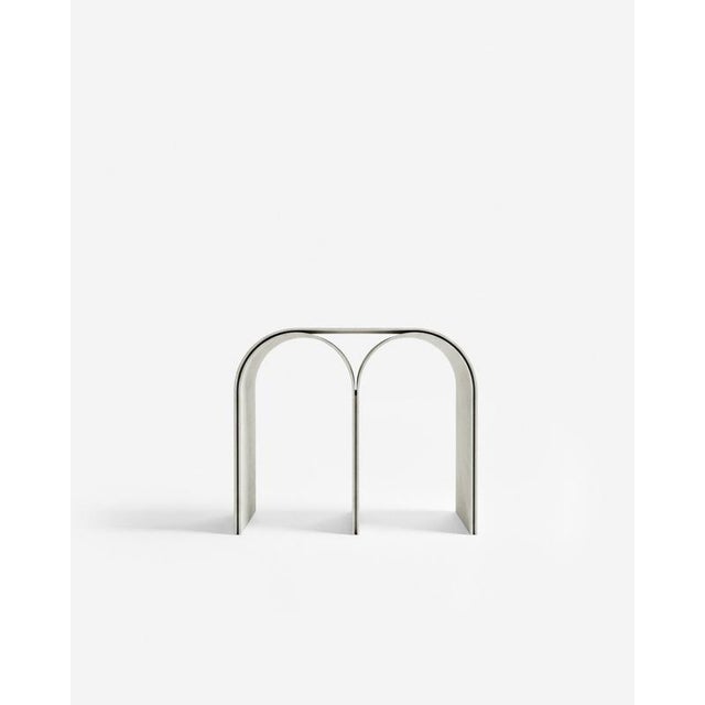 Contemporary white arch stool in steel and plaster by pietro franceschini. Dimensions: w 54 x l 31.5 x h 43 cm. Materials:...