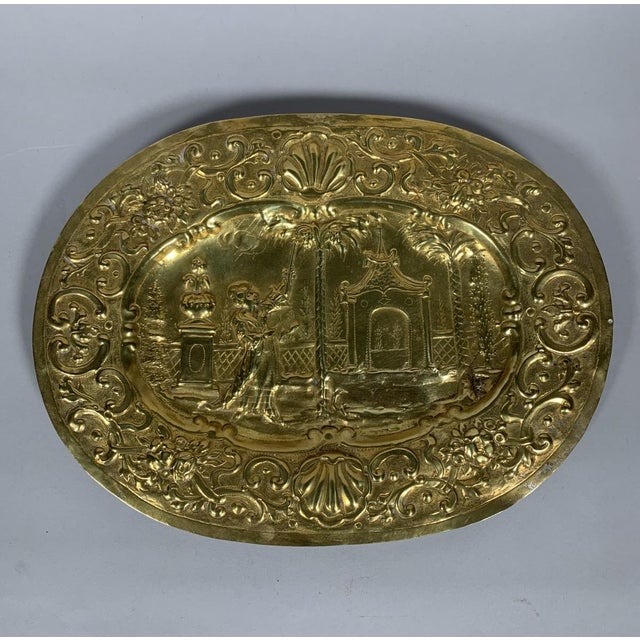 17th century brass offering dish with "Chinese" decoration For Sale